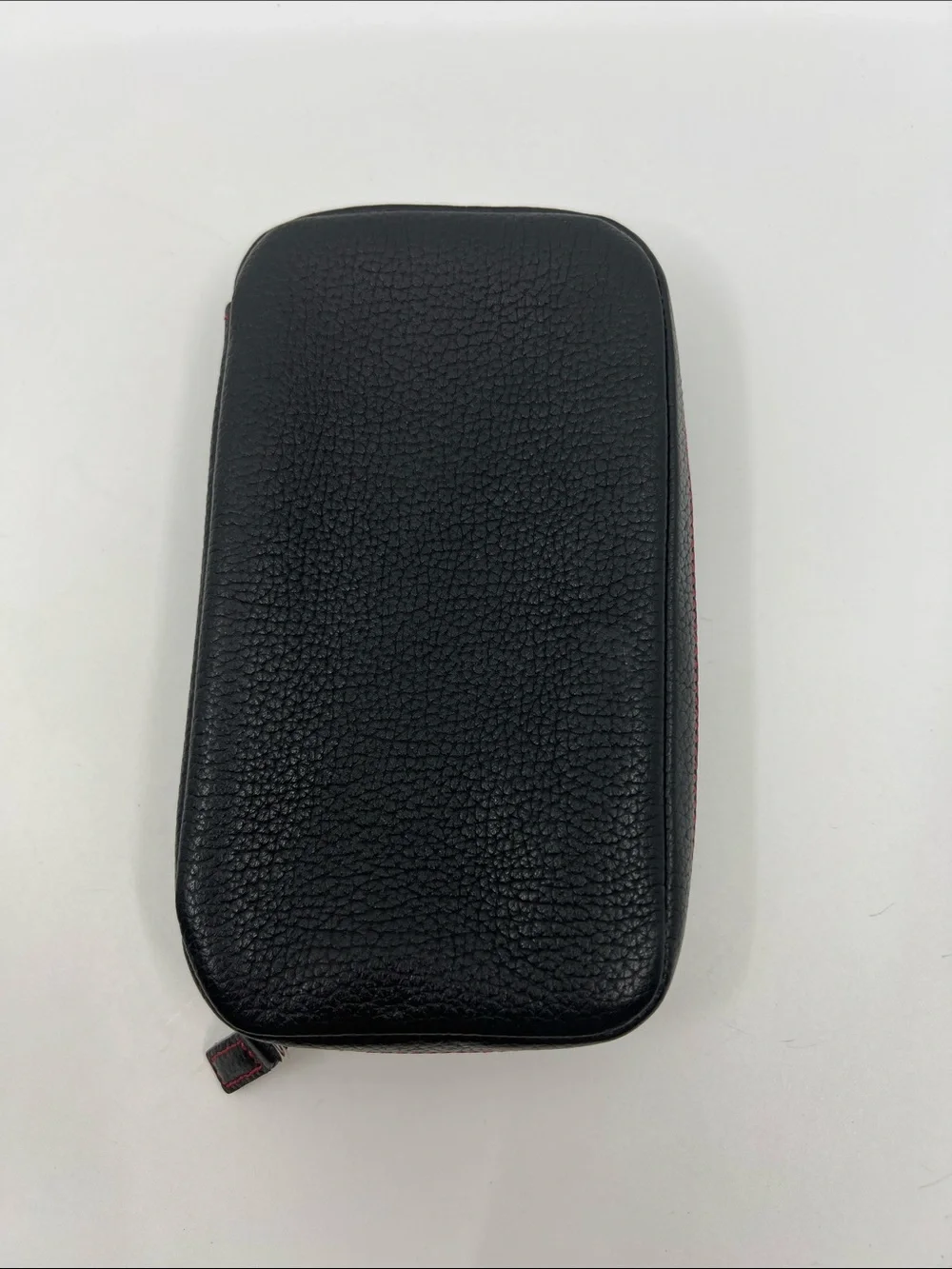 Coach Black Leather zip around Jewelry case with red stitching pig suede lined